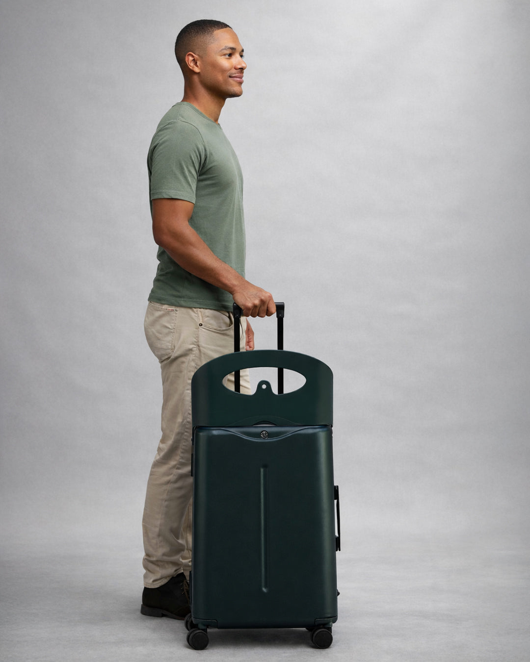 A man pulling a Forest Green Check In