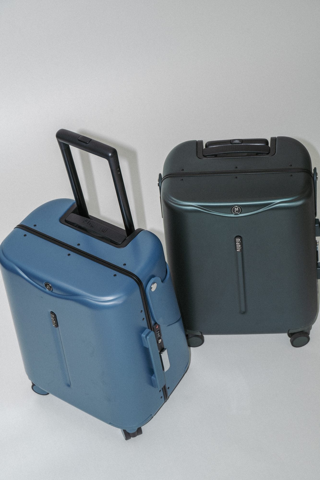 Carry On in Slate Blue beside a Forest Green Check In